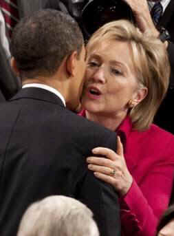 President Barack Obama gives Secretary of State Clinton a hug before he addresses the Joint Session of Congress at the Capitol in Washington on February 24, 2009.