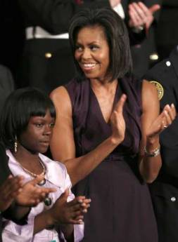 FirstLady Michelle Obama applauds the President before he addresses the Joint Session of Congress at the Capitol in Washington on February 24, 2009.