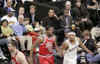 President Obama and his friend Marty Nesbitt watch the NBA match between the Washington Wizards and the Chicago Bulls at the Verizon Center in Washington. Obama is a Bulls fan, however the Wizards won the game 113-90.