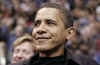 President Obama and his friend Marty Nesbitt watch the NBA match between the Washington Wizards and the Chicago Bulls at the Verizon Center in Washington. Obama is a Bulls fan, however the Wizards won the game 113-90.