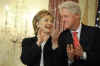 Hillary Clinton is officially sworn in as US Secretary of State by Vice President Joe Biden at the State Department in Washington on February 2, 2009. Guests for the ceremony included former Secretaries of State James Baker and Henry Kissinger. and celebrities like Chevy Chase. Daughter Chelsea and husband Bill Clinton joined the ceremony, with former President Bill Clinton holding the Bible for the swear-in.