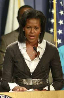 First Lady Michelle Obama visits the Department of Education and speaks with the department staff. Michelle Obama also welcomed Arne Duncan as the new Secretary of Education.