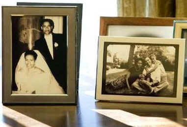 Over the February 1st 2009 weekend President Obama personalizes the Oval Office with family photographs placed on the credenza behind Obama's desk.