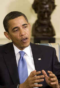 President Barack Obama talks to reporters in the Oval Office of the White House after discussions on his economic stimulus plan.