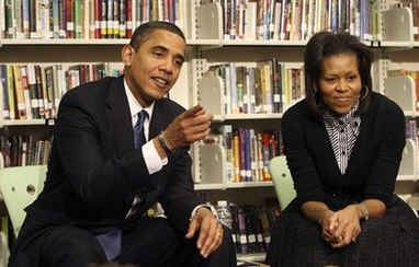 First Lady Michelle Obama and President Barack Obama meet with second graders at Capitol City Public Charter School. The President and First Lady read the children a book on the Apollo 11 moon landing called "Moon Over Star". 