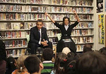 First Lady Michelle Obama and President Barack Obama meet with second graders at Capitol City Public Charter School. The President and First Lady read the children a book on the Apollo 11 moon landing called "Moon Over Star" on February 3, 2009.