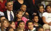 First Lady Michelle Obama and President Barack Obama meet with second graders at Capitol City Public Charter School. The President and First Lady read the children a book on the Apollo 11 moon landing called "Moon Over Star" on February 3, 2009.