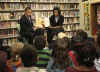First Lady Michelle Obama and President Barack Obama meet with second graders at Capitol City Public Charter School. The President and First Lady read the children a book on the Apollo 11 moon landing called "Moon Over Star" on February 3, 2009.
