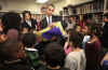 First Lady Michelle Obama and President Barack Obama meet with second graders at Capitol City Public Charter School. The President and First Lady read the children a book on the Apollo 11 moon landing called "Moon Over Star" on February 3, 2009.