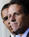 President Barack Obama leaves the Blue Room of the White House and speaks in the Grand Foyer with Treasury Secretary Timothy Geithner. Obama advises that any financial institution that requires a bailout will cap executive salaries at $500,000 per year.