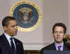 President Barack Obama leaves the Blue Room of the White House and speaks in the Grand Foyer with Treasury Secretary Timothy Geithner. Obama advises that any financial institution that requires a bailout will cap executive salaries at $500,000 per year.