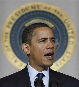President Barack Obama leaves the Blue Room of the White House and speaks in the Grand Foyer with Treasury Secretary Timothy Geithner. Obama advises that any financial institution that requires a bailout will cap executive salaries at $500,000 per year.