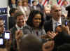 First Lady Michelle Obama continues her commitment to meet department staffers. The First Lady speaks at the Department of Housing and Urban Development in Washington on February 4, 2009. Michelle then mingled with the department staff and supporters.