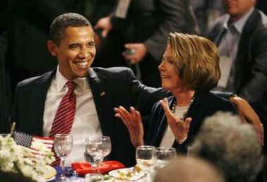 President Barack Obama attends the House Democratic Issues Conference in Williamsburg, Virginia. Obama speaks at the podium for the third time in a busy day for the President. Obama sits with, and is introduced, by Nancy Pelosi.