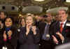 President Barack Obama and First Lady Michelle Obama attend the National Prayer Breakfast in Washington on February 5, 2009. Other attendees included world leaders such as Tony Blair the former UK Prime Minister. Hillary Clinton applauds Obama's remarks.