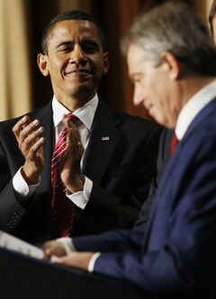 President Barack Obama and First Lady Michelle Obama attend the National Prayer Breakfast in Washington on February 5, 2009. Other attendees included world leaders such as Tony Blair (speaking) the former UK Prime Minister.