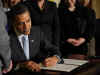 President Obama signs an Executive Order creating the Women and Girls Council aimed at high level reform on women's issues.