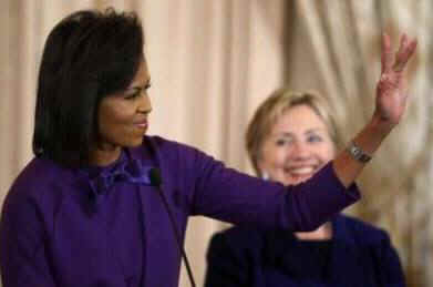 First Lady Michelle Obama and Secretary of State Hillary Clinton join in presenting the Secretary of State's International Women of Courage awards to women recipients from around the world on March 11, 2009.