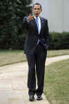 President Barack Obama escorts Da Silva across the South Lawn of the White House to a waiting limousine.