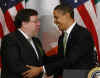 President Barack Obama is given a bowl of shamrocks by Irish Prime Minister Brian Cowen at the annual Shamrock Ceremony n the Roosevelt Room of the White House on St. Patrick's Day, March 17, 2009.