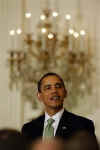 President Barack Obama, First Lady Michelle Obama, and Vice President Joe Biden join Irish Prime Minister Brian Cowen and leaders from Northern Ireland for a St. Patrick's Day reception in the East Room of the White House on March 17, 2009.