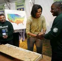 First Lady Michelle Obama visits the Youth Build USA organization who are celebrating their 30th Anniversary. The group is building an affordable and efficient home called the Green Home Building Project to commemorate their anniversary on March 17, 2009. 