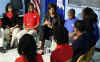 First Lady Michelle Obama discusses career goals with students at Anacostia High School in Washington, DC on March 19, 2009.