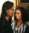 First Lady Michelle Obama hosts a kickoff celebration for the Top 21 Women in Their Field at the White House on March 19, 2009.