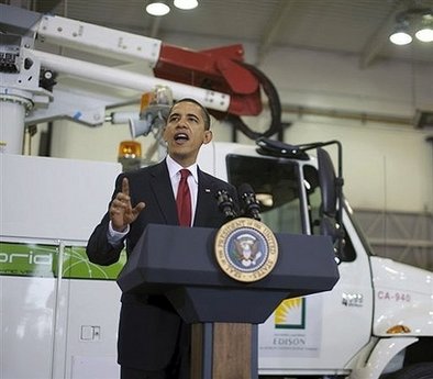 President Barack Obama tours the Electric Vehicle Technical Center in Pomona California. President Obama announced $2.4 billion in federal funds for the development of electric vehicles.