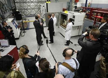 President Barack Obama tours the Electric Vehicle Technical Center in Pomona California. President Obama announced $2.4 billion in federal funds for the development of electric vehicles.