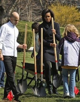 First Lady Michelle Obama plants a White House Kitchen Garden with the help of 5th graders from Bancroft Elementary School in Washington DC. 