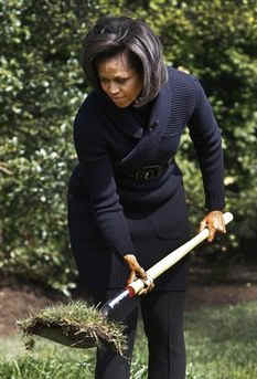 First Lady Michelle Obama plants a White House Kitchen Garden with the help of 5th graders from Bancroft Elementary School in Washington DC. 