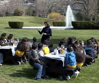 First Lady Michelle Obama plants a White House Kitchen Garden with the help of 5th graders from Bancroft Elementary School in Washington DC. 