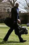 President Obama's personal aide, Reggie Love, travels with Obama carrying gym bags and a basketball. President Barack Obama and First Lady Michelle Obama depart the White House for a weekend trip to Camp David via Marine One.