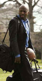 President Obama's personal aide, Reggie Love, travels with Obama carrying gym bags and a basketball. President Barack Obama and First Lady Michelle Obama depart the White House for a weekend trip to Camp David via Marine One.