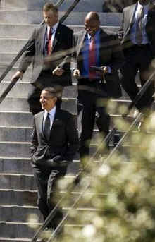 resident Barack Obama after speaking at the Eisenhower Executive Office Building on March 23, 2009. 