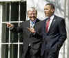 After meeting with the media President Obama walked Australian PM Rudd to his waiting limousine and returned to the Oval Office.