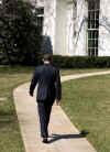 After meeting with the media President Obama walked Australian PM Rudd to his waiting limousine and returned to the Oval Office.