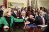 President Barack Obama, members of Congress, and local students speak to the astronauts on the International Space Station and the Shuttle Discovery crew from the Roosevelt Room of the White House on March 23, 2009.
