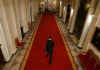 President Obama walks down the Cross Hall after media event. President Obama holds a one-hour live prime time news conference in the East Room of the White House on March 24, 2009.