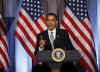 President Barack Obama speaks at a Democratic National Committee fundraiser at the National Women in the Arts Museum in Washington, DC on March 25, 2009. Obama is introduced by DNC Chairman Tim Kaine.