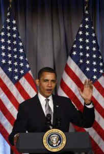 President Barack Obama speaks at a Democratic National Committee fundraiser at the National Women in the Arts Museum in Washington, DC on March 25, 2009. Obama is introduced by DNC Chairman Tim Kaine.