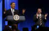 President Barack Obama speaks at a Democratic National Committee fundraiser at the Warner Theater in Washington, DC on March 25, 2009. The DNC slogan is "Organizing for America."