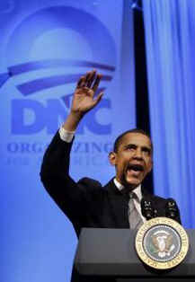 President Barack Obama speaks at a Democratic National Committee fundraiser at the Warner Theater in Washington, DC on March 25, 2009. The DNC slogan is "Organizing for America." 