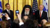 President Barack Obama and Vice president Joe Biden commemorate Greek Independence Day in the East Room of the White House on March 25, 2009. Greek Orthodox in America Archbishop Demetrios joined the East Room celebration.