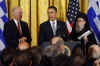 President Barack Obama and Vice president Joe Biden commemorate Greek Independence Day in the East Room of the White House on March 25, 2009. Greek Orthodox in America Archbishop Demetrios joined the East Room celebration.