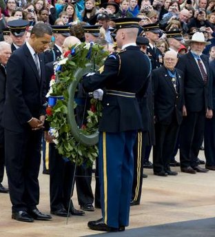 President Barack Obama lays a wreath at the Tomb of the Unknown Soldier, and greets Medal of Honor winners during National Medal of Honor Day at Arlington National Cemetery in Arlington, Virginia on March 25, 2009.
