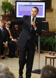 President Barack Obama holds his first online town hall style "Open for Questions" program in the East Room of the White House. President Obama answered a range of questions from the online White House site that received over 3.5 million responses.