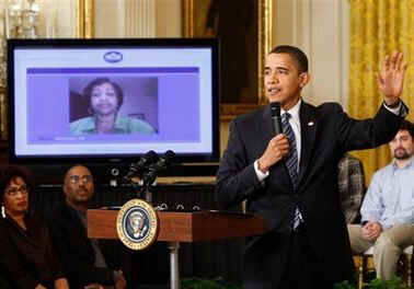 President Barack Obama holds his first online town hall style "Open for Questions" program in the East Room of the White House. President Obama answered a range of questions from the online White House site that received over 3.5 million responses. 