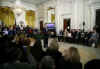 President Barack Obama holds his first online town hall style "Open for Questions" program in the East Room of the White House. President Obama answered a range of questions from the online White House site that received over 3.5 million responses.